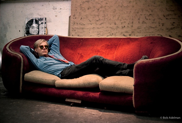 Andy Warhol on the Factory couch from the 1964 film Couch with Jackie on back wall 1965 by Bob Adelman on artnet